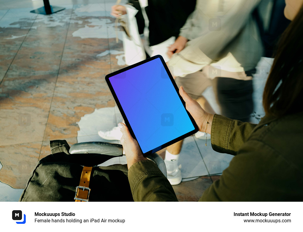 Female hands holding an iPad Air mockup