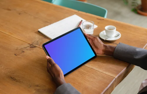 Female entrepreneur working on an iPad Air mockup