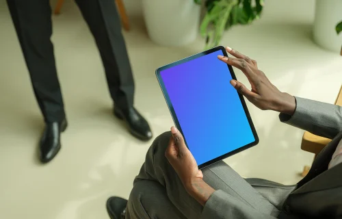 Female entrepreneur working on iPad Air mockup
