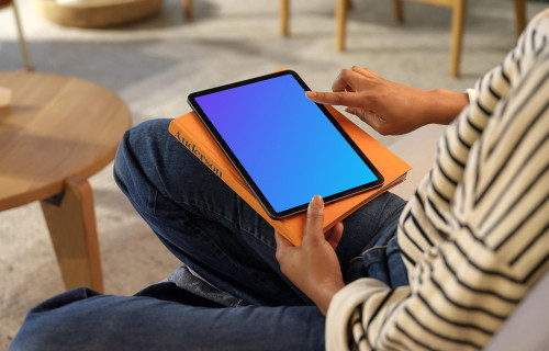 Person scrollin on an iPad Air mockup