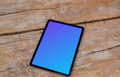 Tablet mockup on wooden table