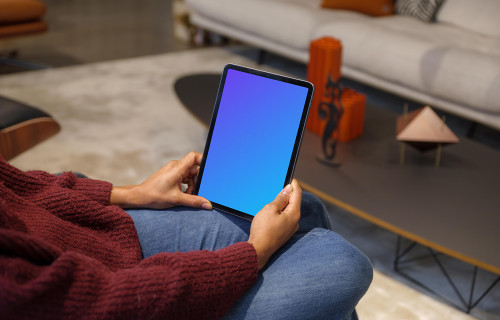 Woman in burgundy sweater with iPad Air mockup