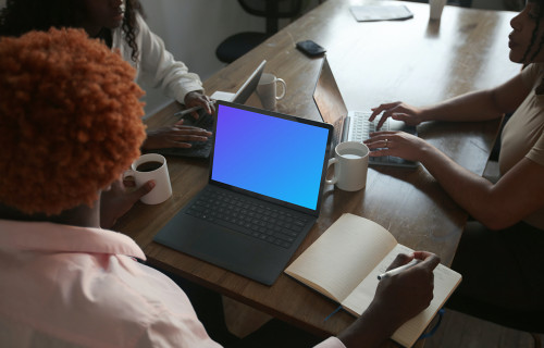 Woman reading on Microsoft Surface Laptop mockup