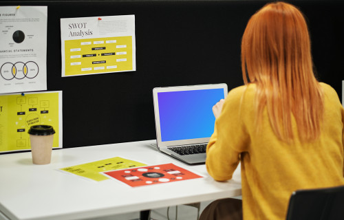 Woman using a MacBook Air mockup