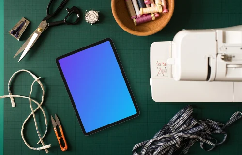 Tablet mockup on green work mat