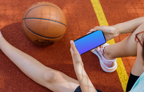 Woman hands holding an iPhone 13 mockup