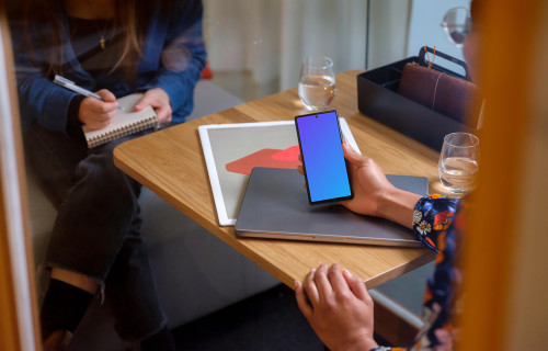 Woman holding a Google Pixel mockup