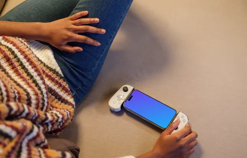 iPhone 15 Pro mockup in a casual gaming setup