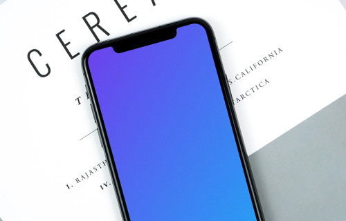 Light scene with iPhone XS mockup and magazine