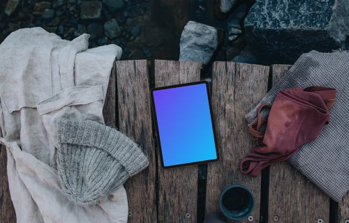 Outdoor aquatic scene with an iPad mockup