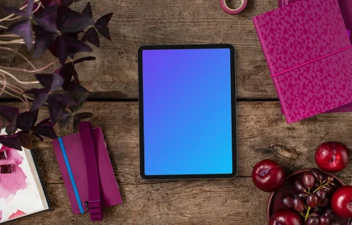 Tablet between Viva Magenta books