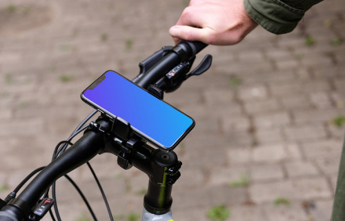 Man sat on a bike with iPhone 11 Pro mockup in bike mount