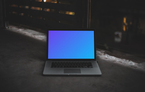 Dark mockup scene with Macbook Pro