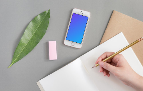 iPhone SE mockup next to the journal