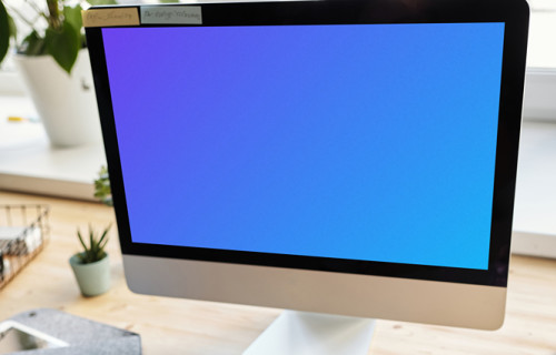Kid working on iMac mockup