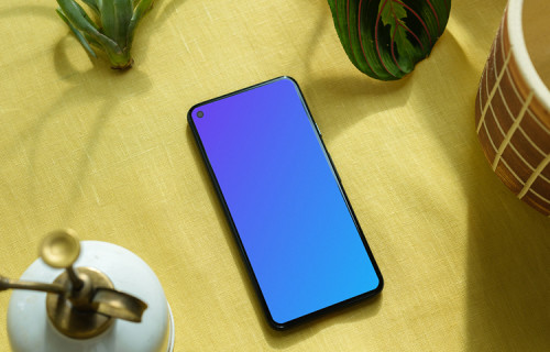 Pixel 5 mockup on a yellow table